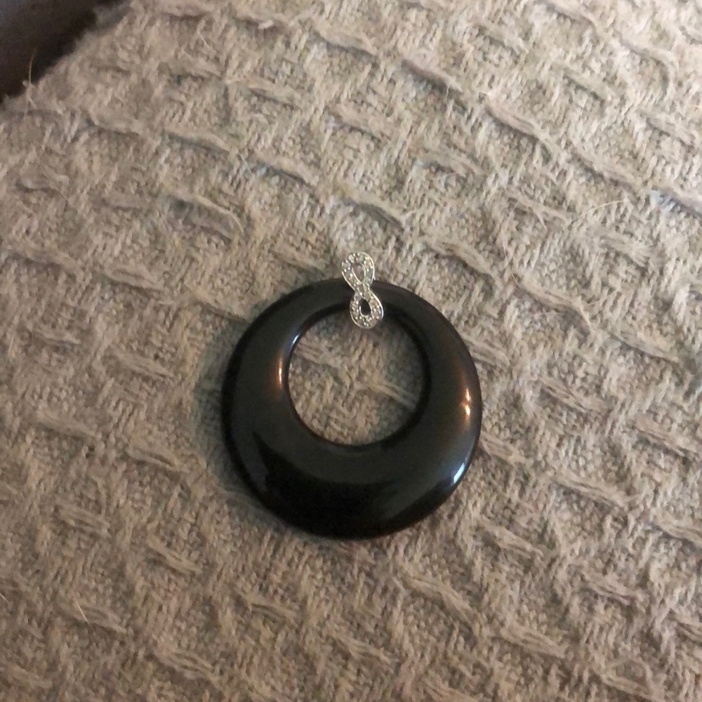 Onyx and diamond chip pendant